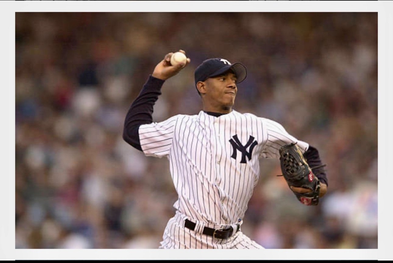Adrian Hernandez delivering a pitch for the New York Yankees at Yankee Stadium